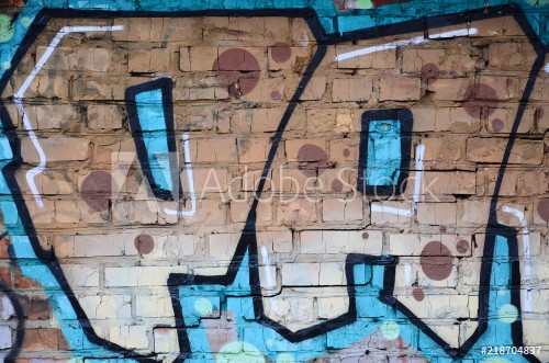 Picture of Fragment of graffiti drawings The old wall decorated with paint stains in the style of street art culture Colored background texture